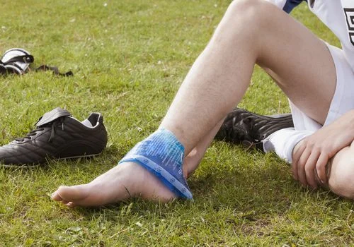 soccer player icing ankle 59d4d428054ad90010127473